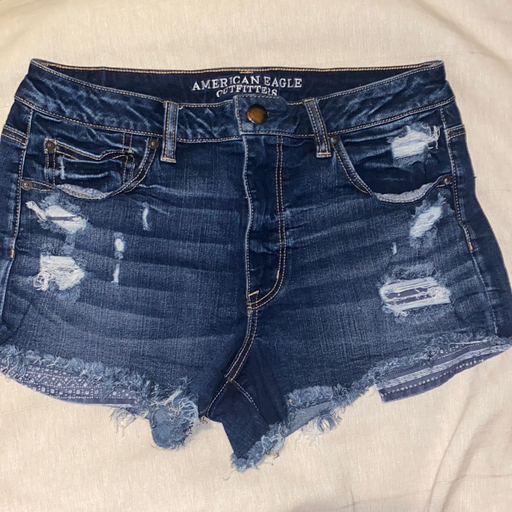AMERICAN EAGLE OUTFITTERS HI-RISE FESTIVAL Size 12 Distressed